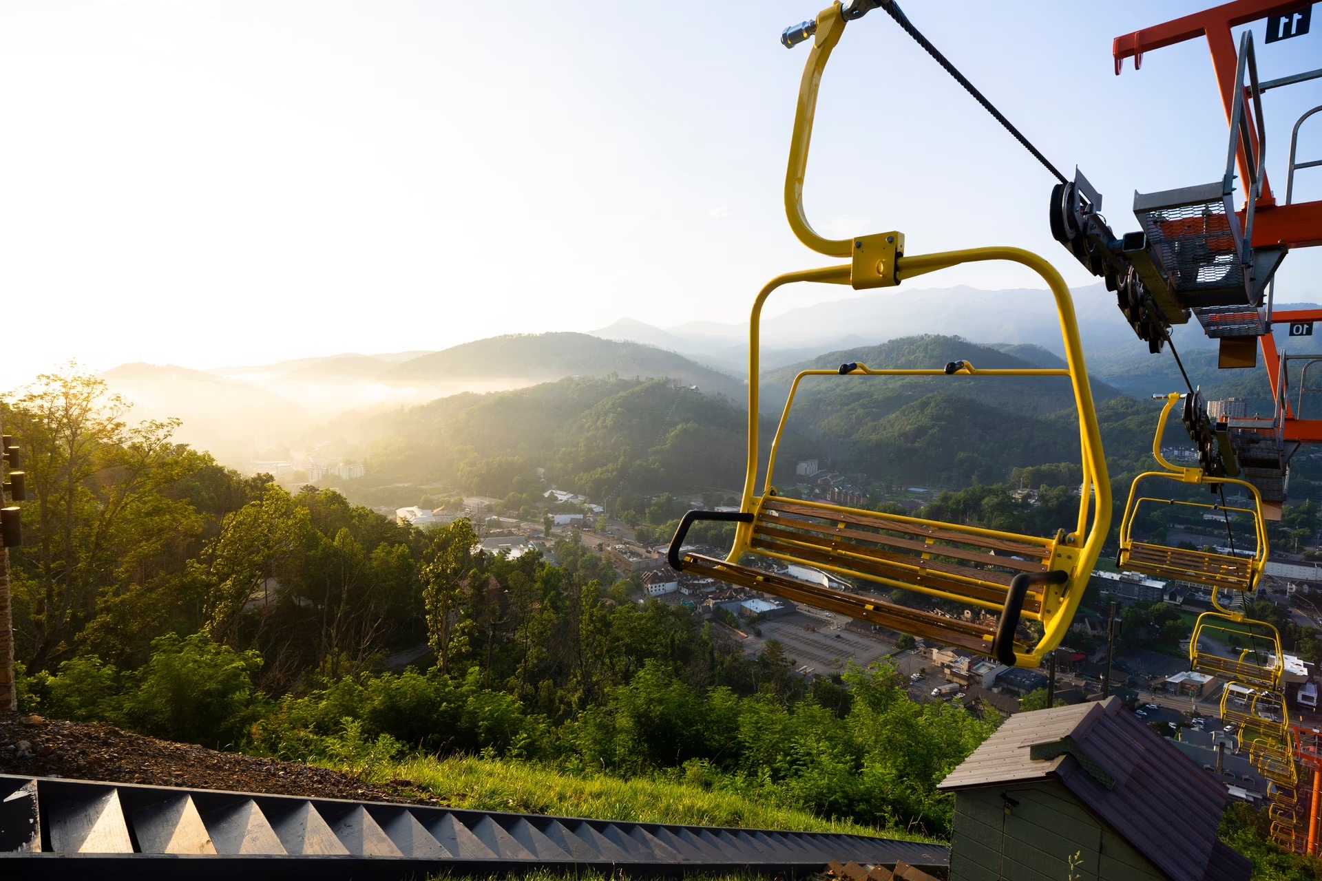 Chairlift with mountain view behind it at Gatlinburg SkyPark, Smoky Mountains
